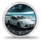 Porsche Cayman mintás falióra fehér színű német sportkocsival száguldás közben és egyedi névvel kérhető számlappal