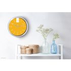 Sárga falióra – letisztult modern stílus
