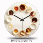  Kávés falióra kör alakban elrendezett porcelán csészékkel és kávékülönlegességekkel fehér háttérben